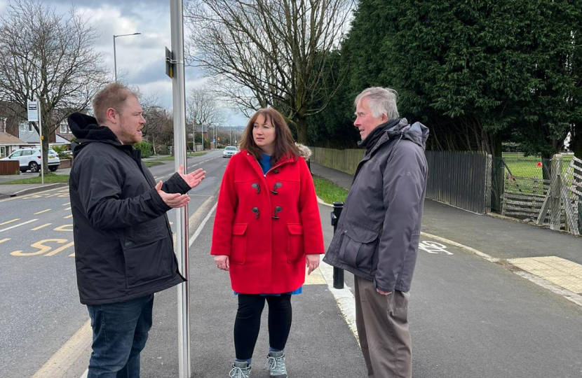 3 candidates at a bus stop