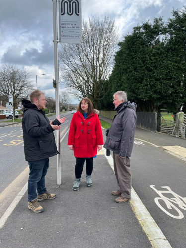 3 candidates at a bus stop