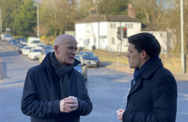 Paul and Nigel Noble discussing traffic in Marple Bridge